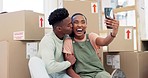 Selfie, new home or happy black couple on social media in living room to celebrate a goal together. Smile, real estate or African people kiss in dream house taking photo or picture  to post online