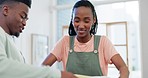 Couple, packing box and help with moving house for real estate, relocation and property investment. Black man and woman happy about new home, mortgage loan and pillow for decoration and thank you