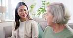 Consulting, talking and woman with a financial advisor for retirement planning, meeting and home care. Finance, help and a consultant speaking with senior person on the sofa for legal advice together