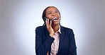 Business woman, laughing and phone call in studio for consulting contact, chat or talking on grey background. Happy african worker, mobile communication or surprise for feedback of funny conversation