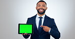 Tablet, green screen and business man in presentation, advertising mockup and website design in studio. Face of corporate employee or african person with digital tracking markers on white background