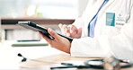 Woman, hands and doctor with tablet in research, Telehealth or communication on desk at hospital. Closeup of female person, medical or healthcare professional with technology for online networking