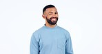 Face, funny man and wink in studio isolated on a white background mockup space. Portrait, flirting and laughing person blink eye, happy smile and confident in clothes for  trendy fashion style