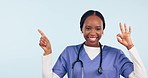 Face, woman and doctor advertising ok in studio, mockup space and information on white background. Portrait, happy african nurse and presentation of medical review, healthcare news and good results