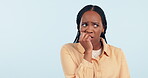 Woman, studio and biting nails with anxiety, stress and bad habit on mockup space at white background. Scared, fear and nervous african model chewing fingers, terror for worry and thinking of horror 