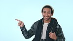Happy asian man, backpack and pointing for list in advertising, marketing or branding against a studio background. Male person, tourist or explorer showing sale or discount for travel on mockup space