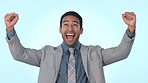 Happy businessman, fist pump and celebration in winning, achievement or success against a studio background. Excited asian man in business promotion, victory goals or target for deal on mockup space