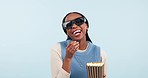 Woman, popcorn and 3d movie in studio, cinema and happy for eating, funny show and blue background. African girl student, food and snack for glasses on face, streaming or watching tv film for comedy