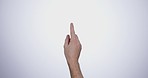 Finger, hand and click tablet in studio isolated on a white background mockup space. Closeup, touchscreen and press, scroll or swipe on digital technology, phone and gesture on mobile internet app.