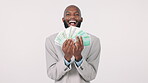 Cash, finance and a man lottery winner in studio on white background with money, bonus or salary increase. Portrait, success and smile with a business employee excited by a financial investment deal