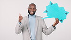 Speech bubble, black man and thumbs up for banner in studio for marketing and advertising with smile and mockup space. Professional person, communication and tracking marker for product placement 