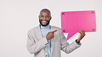 Speech bubble, black man and pointing at banner in studio for marketing and advertising with smile and mockup space. Professional person, communication and tracking marker for product placement 