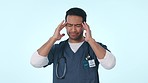 Asian man, doctor and headache in stress, burnout or mental health against a studio background. Tired male person, nurse or healthcare employee with migraine, anxiety or pressure in pain on mockup