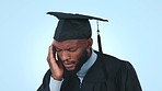 Robe, graduate and black man with burnout, headache and health issue on a blue studio background. African person, academic and college student with a migraine, medical problem and stress with pain