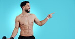 Fitness, timeline or chart with a shirtless man in studio on a blue background to follow a health list. Exercise, training and body of a young sports athlete training with a dumbbell workout plan