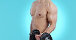 Dumbbell, exercise and arm of a bodybuilder in studio for workout, challenge or muscle growth. Strong man, body and athlete person lifting for fitness, training and mockup on a blue background