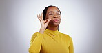 Happy, black woman and perfect sign at studio isolated on white background mockup space. Kiss emoji, excellence and hand gesture of success, ok and feedback for high quality of funny person laughing