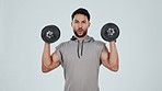 Fitness, weightlifting and face of man with dumbbells on gray background for strong muscles or strength. Sports, weights and portrait of person for exercise, bodybuilder training or workout in studio