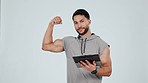 Fitness, tablet and man flex in studio for exercise, training and workout for wellness app. Sports, hey you and portrait of person on digital tech for social media, website and gym on gray background