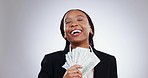 Money fan, smile and black woman in studio with payment, loan or savings cashback on grey background. Bingo, winner and face of African lady model with cash from poker, casino or sale, invest or deal