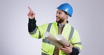 Architect, man and pointing with checklist for blueprint, engineering plans and steps in studio. List, promotion choice and male engineer with project, construction and builder with grey background