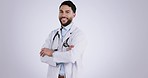 Man, face and doctor smile in studio for healthcare services, surgery or consulting on mockup white background. Portrait of happy arab surgeon, medical professional and arms crossed from Saudi Arabia