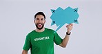 Speech bubble, man and face with smile and show social media voice and message in studio. Volunteer, happy charity worker and male person with tracking markers and opinion with white background