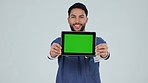 Face, doctor and man with a tablet, green screen and healthcare on a white studio background. Portrait, medical professional and model with tech, mockup space and connection with digital innovation