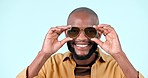 Sunglasses, happy and face of black man in a studio with stylish, cool and trendy fashion. Smile, style and confident young African male model with edgy face accessory isolated by white background.