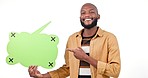 Happy black man, speech bubble and pointing in social media advertising against a studio background. Portrait of African male person smile showing shape for feedback, comment or question on mockup