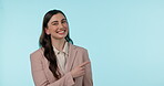 Pointing finger, happy and a business woman in studio for review, advertising or announcement. Portrait of a professional person with marketing, presentation or promotion offer on blue background