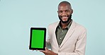 African man, tablet and green screen for business advertising, presentation mockup and design space in studio. Face of professional person on digital technology and tracking marker on blue background