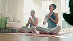 Couple, yoga fitness and praying with home meditation, zen exercise and mindfulness, healing or peace. People with namaste hands for calm energy, holistic training and spiritual workout or wellness