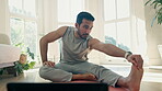 Man, stretching and touch foot for yoga at home, virtual exercise class with laptop and fitness in living room. Flexibility, body and wellness with pilates, online lesson for health and self care