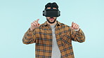 Business man, VR glasses and hands for software development, digital interaction or user experience on blue background. Startup developer or IT person, virtual reality and future technology in studio