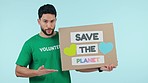 Poster, studio man and volunteer gesture at Earth Day placard sign, eco notification or NGO service. Save the planet banner, climate change presentation and portrait person talking on blue background