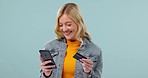 Credit card, smartphone and ecommerce with woman in studio, fintech and payment on blue background. Smile for online shopping sale, finance and mockup space, internet banking with customer on app 