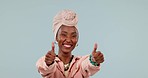 Thumbs up, face and woman in studio for success, winning deal and achievement on grey background. Portrait of happy african model, emoji and like sign for feedback, voting yes and support excellence