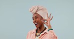 Studio, happy black woman and okay sign for opinion vote, perfect or gesture for approval, feedback or praise. Portrait, emoji icon or African person success, agreement and ok wink on blue background