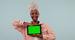 Woman, student and tablet green screen for e learning, online education or creative presentation in studio. Face of African person on digital mockup or tracking marker for college on blue background