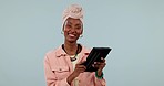 Tablet, smile and scrolling with a black woman in studio on a gray background for research or information. Portrait, technology and social media with a happy person using the internet to search