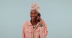 Business, phone call and black woman with smile, connection and funny on a blue studio background. African person, accountant and happy employee with a smartphone, communication or laughing with joke