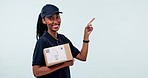 Box, happiness and black woman point at delivery information, mockup studio space or shipping announcement. Advertising portrait, cargo order distribution and safe courier services on blue background