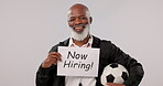 Sign, hiring and face of a black man for soccer team, recruitment and looking for people. Happy, portrait and a mature football coach with a paper, banner or training for group of a game or match