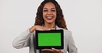 Green screen, smile and face of woman with tablet in studio with social media, news or guide on white background. Digital, space and portrait of lady model with sign up app, process or application