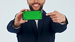 Pointing, business man and green screen of phone for advertising space, sign up offer and tracking markers in studio. Closeup, hands or worker show mobile contact, news and mockup on white background