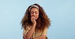 Stress, anxiety and young woman in studio biting her nails for crisis, scared or worry reaction. Anxious, mistake and female model from Colombia with fear face expression isolated by white background