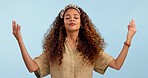 Woman, lotus hands and meditation, peace or breathing for mental health, wellness or calm in studio. Young african person with yoga training, mindfulness and chakra energy or zen on a blue background