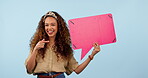 Woman, speech bubble and communication, social media or fashion chat for reviews or opinion on blue background. Face of african person waves hello with quote, voice poster and presentation in studio