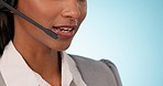 Call center, mouth and woman consulting in studio for customer service, FAQ advisory or IT questions. Face, lips or closeup of telemarketing agent with microphone for communication on blue background